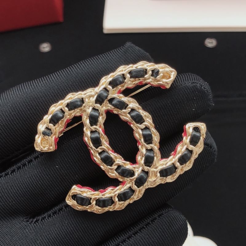 Ch**el brooches